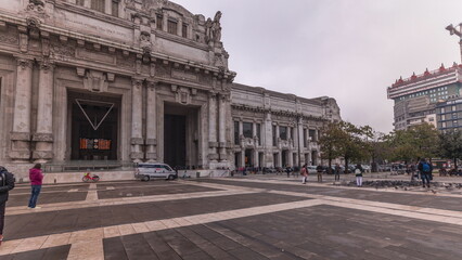 Obraz premium Panorama showing Milano Centrale timelapse - the main central railway station of the city of Milan in Italy.