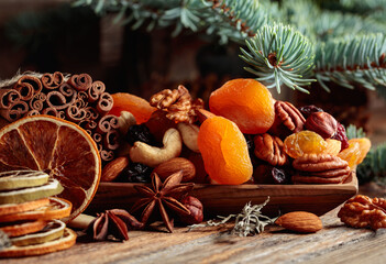 Christmas still-life with dried fruits and nuts.