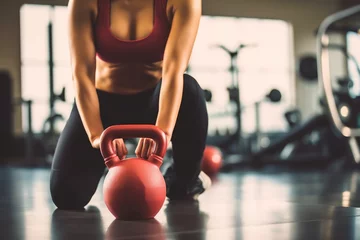 Fototapeten Close up kettlebells with woman exercise workout in gym fitness breaking relax after sport training with protein shake bottle background. Healthy lifestyle bodybuilding and muscles, Generative AI © Focal Imaging