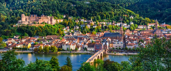 Fototapeten Landmarks and beautiful towns of Germany - medieval historc Heidelberg , panoraic view with Karl Theodor bridge and castle. © Freesurf