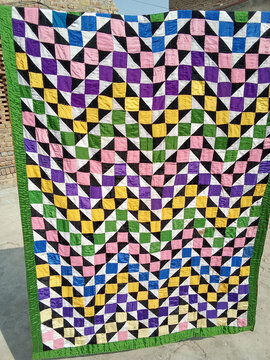 Pakistani bahawalpuri saraiki colorfull handmade homemade handicraft traditional background wallpaper quilt design