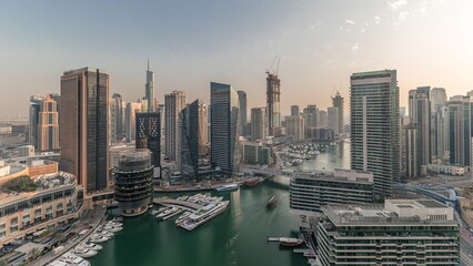 Panorama showing overview to JBR and Dubai Marina skyline with modern high rise skyscrapers...