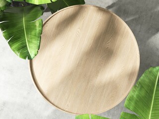 Top view of round wooden podium table, green tropical banana tree in sunlight. Luxury organic...