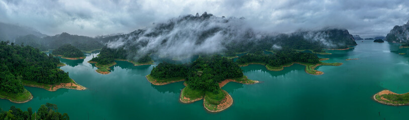 Aerial drone view of island on the lake, tropical Mountain peak , Khao Sok National Park, Thailand