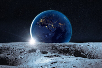 Moon with craters in deep space. Moon and Earth at night. Elements of this image furnished by NASA.
