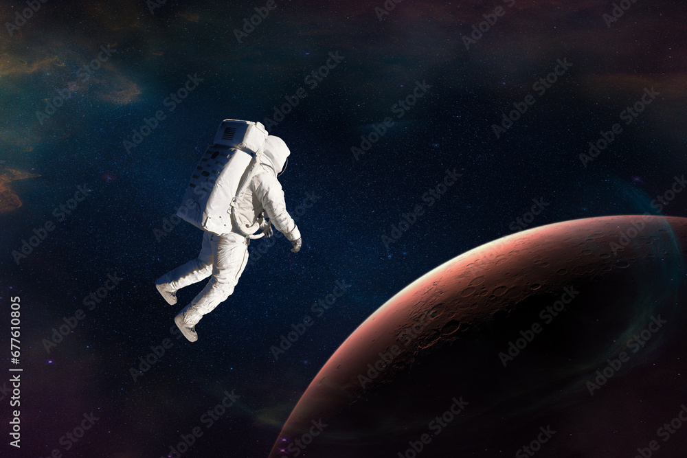 Wall mural astronaut in outer space close to mars planet. elements of this image furnished by nasa.