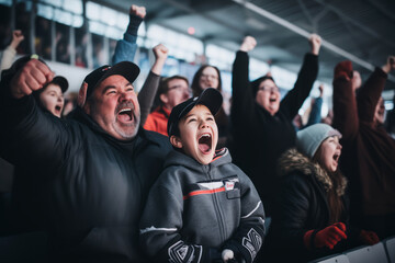 Excited parents and kids celebrating the victory of their team. Sports fans chanting and cheering for their ice hockey team. Family with children watching hockey match. - obrazy, fototapety, plakaty