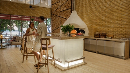 A couple of men and woman having dinner in an Italian restaurant in Thailand