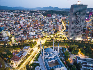 Aerial image of Tirana city skyline on early evening - obrazy, fototapety, plakaty