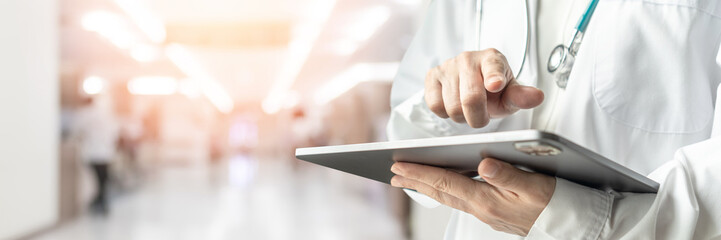 Medical doctor or physician in lab coat diagnose patient’s health online using mobile tablet in...