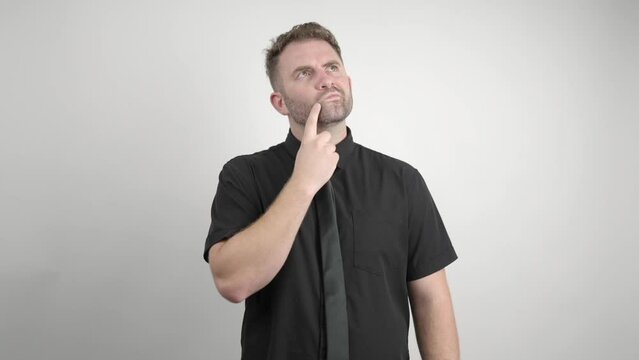 man in black shirt gets an idea on a white background