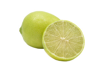 Lime fruit next to a lime cut in half on a cutout PNG transparent background
