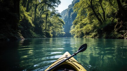 Adventurous kayaking in a remote river surrounded by dense forest