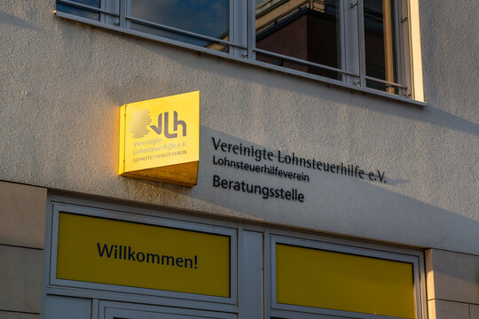 DRESDEN, GERMANY - 16. July 2023: Vereinigte Lohnsteuerhilfe e.V. (income tax help) logo sign on a building wall. There you can get tax advice if you are earning money in Germany.