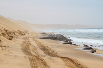 Off road track that runs along the ocean in Walvis bay, Namibia
