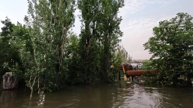 Flooding in Kherson town as a result of the explosion of a dam on the Dnipro river in city of Novaya Kakhovka. Consequences of the detonation of Kakhovka Hydroelectric Power Station. War in Ukraine.