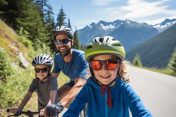 Tuinposter Cycling family of three in mountain road © Slepitssskaya