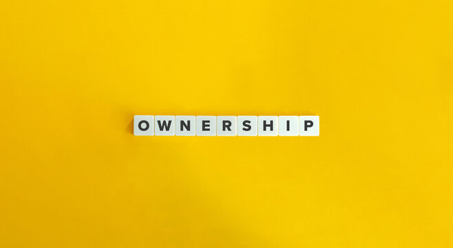 Ownership Word on Block Letter Tiles. Orange Yellow Background. Minimal Aesthetic.