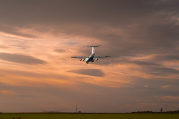 An airplane flying low during landing