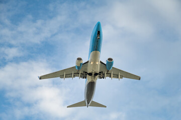 An airplane flying low during landing