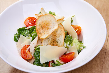 caesar salad on the plate