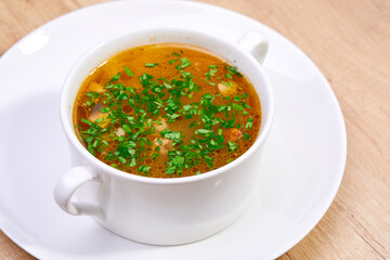 soup with organic vegeatable on wooden board