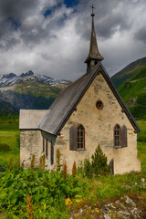 Fototapeta na wymiar Old historic church at Grimselpass Switzerland
