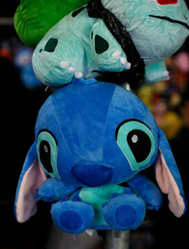 Stitch and Bulbasaur plush toys. Movie characters: Lilo and Stitch and Pokemon. Soft toys for children. Collectibles.