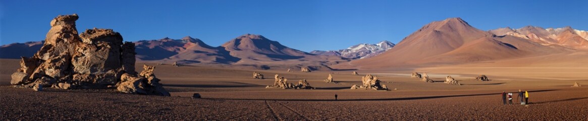 Panoramic view of rock formation in the Dali Desert at sunset in Bolivia.