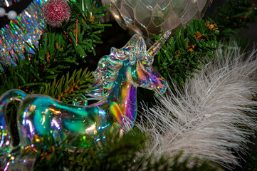 Xmas holiday celebration. New Year tree at Christmas eve. Xmas tree decoration. Santa Claus. Balls...