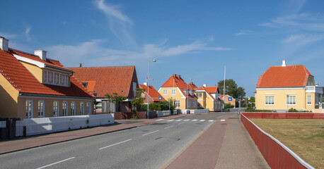 Cityscape of Skagen - most northern town of Denmark (North Jutland, Nordjylland). Summer view of the street with classic danish houses.