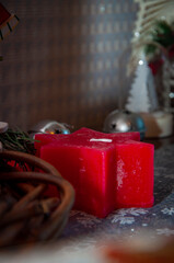 Decoration for New Year holiday celebration. Christmas tree decorated with Xmas festive decoration. New Year tree at Christmas eve. December holiday in winter. Xmas sale and discount. Red candle