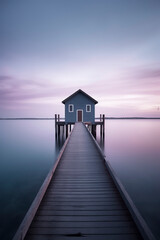 Fototapeta premium A Tranquil Evening: The Wooden Walkway Leading to a Lake House at Sunset, ai generative