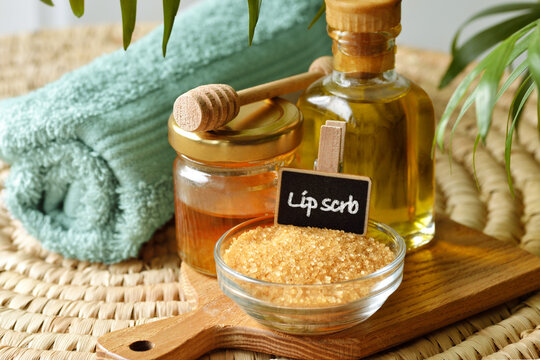 Homemade lip scrub made out of brown sugar, honey and olive oil - Natural ingredients for DIY beauty product
