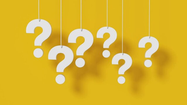 Many question mark hanging on yellow background.