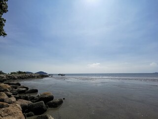 Seaside view with bright sky