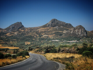 Road in the mountains against clear blue sky in Crete, Greece, June 2008