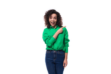 cute young woman with black curly hair dressed in a green shirt is inspired by the idea