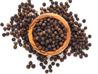  top view of black pepper in a wooden bowl