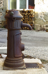 A public fountain in the street of Provence