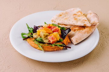Healthy roasted red pepper hummus and pita bread
