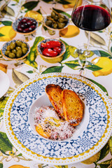 Tasty beef steak tartare with glass of wine