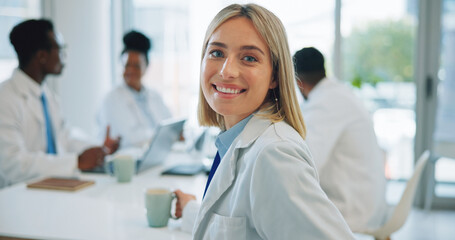 Portrait, woman and doctors in a meeting, smile and healthcare with planning, hospital and...