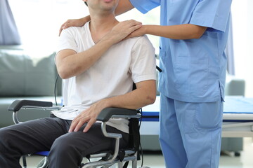 Doctor is inquiring about the condition of a patient with a leg injury in a hospital examination...
