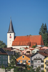 View of Catholic St. Bartholomew's Church in Passau, Germany from the Danube river bank.