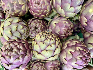 raw vegetable background with fresh artichokes 