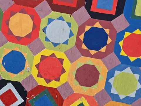full frame shot of Moroccan painted traditional mosaic called Zelige with abstract effect