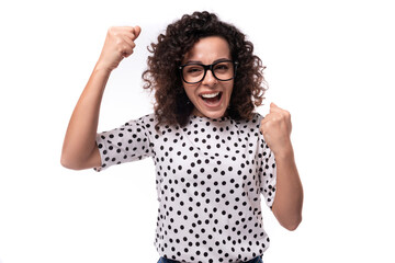 young caucasian woman with curly hair styling smiling with happiness