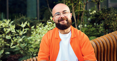 Young handsome man wearing casual clothes smiling happy. Close up portrait of cheerful guy in...