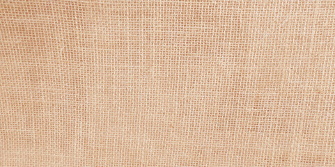 Cream abstract Hessian or sackcloth fabric or hemp sack texture background. Wallpaper of artistic wale linen canvas. Blanket or Curtain of cotton pattern with space for text decoration. Light pattern.